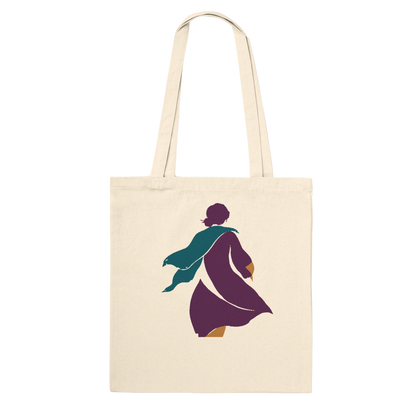 THE TURN natural cotton art tote featuring an aubergine woman in motion with a flowing petrol-blue scarf.