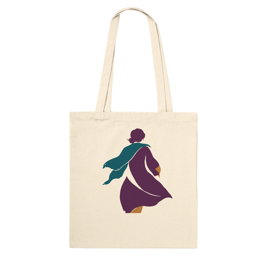THE TURN natural cotton art tote featuring an aubergine woman in motion with a flowing petrol-blue scarf.