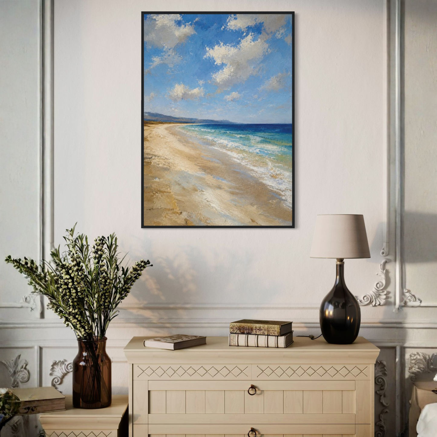 Close-up of Mediterranean coastal wall art with pale beach, blue water, soft clouds and painterly texture.