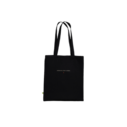 Reverse view of THE ALIGNMENT black cotton tote featuring the affirmation “return to your centre."