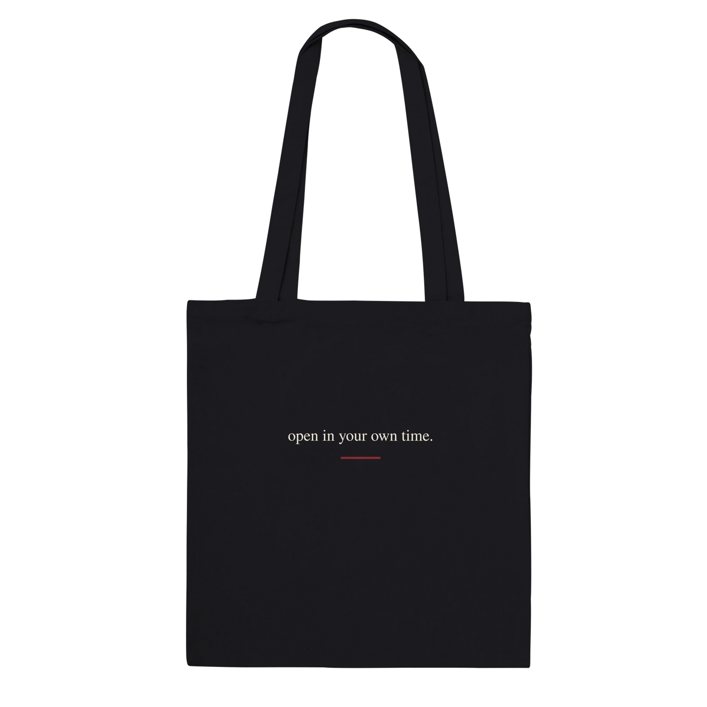 Back view of THE BLOOM black tote bag with warm-ivory serif affirmation