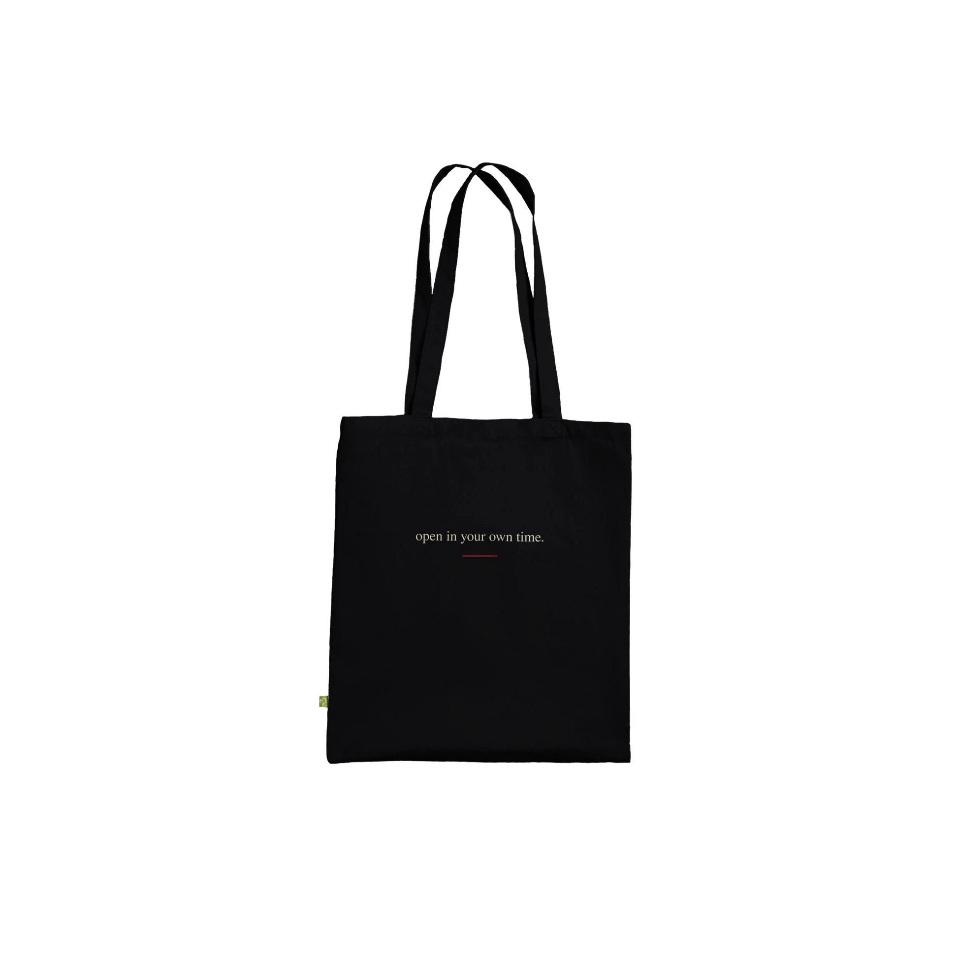 Reverse of THE BLOOM tote featuring the affirmation open in your own time