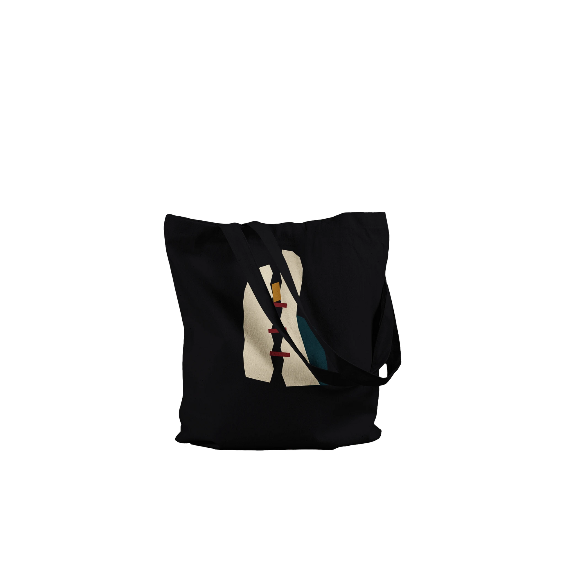 Folded THE MENDING black cotton tote showing its fractured ivory, oxblood, petrol and ochre abstract artwork.