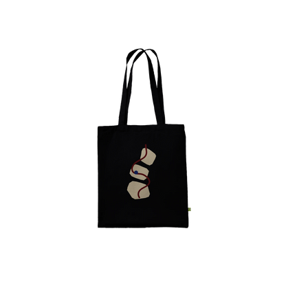THE THREAD premium black cotton tote with ivory abstract forms, an oxblood path and mineral-blue detail.
