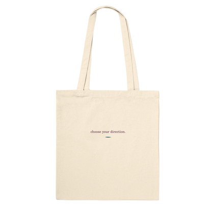 Reverse view of THE TURN natural cotton tote with the affirmation choose your direction printed discreetly on the back.