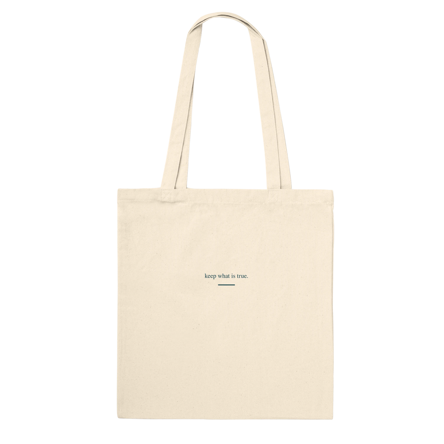 THE KEEPING natural cotton tote shown from the back with small petrol serif affirmation