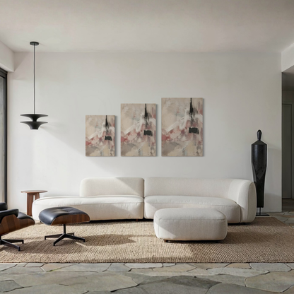 The Unsaid neutral canvas art displayed above a curved cream sofa in a refined contemporary living room.