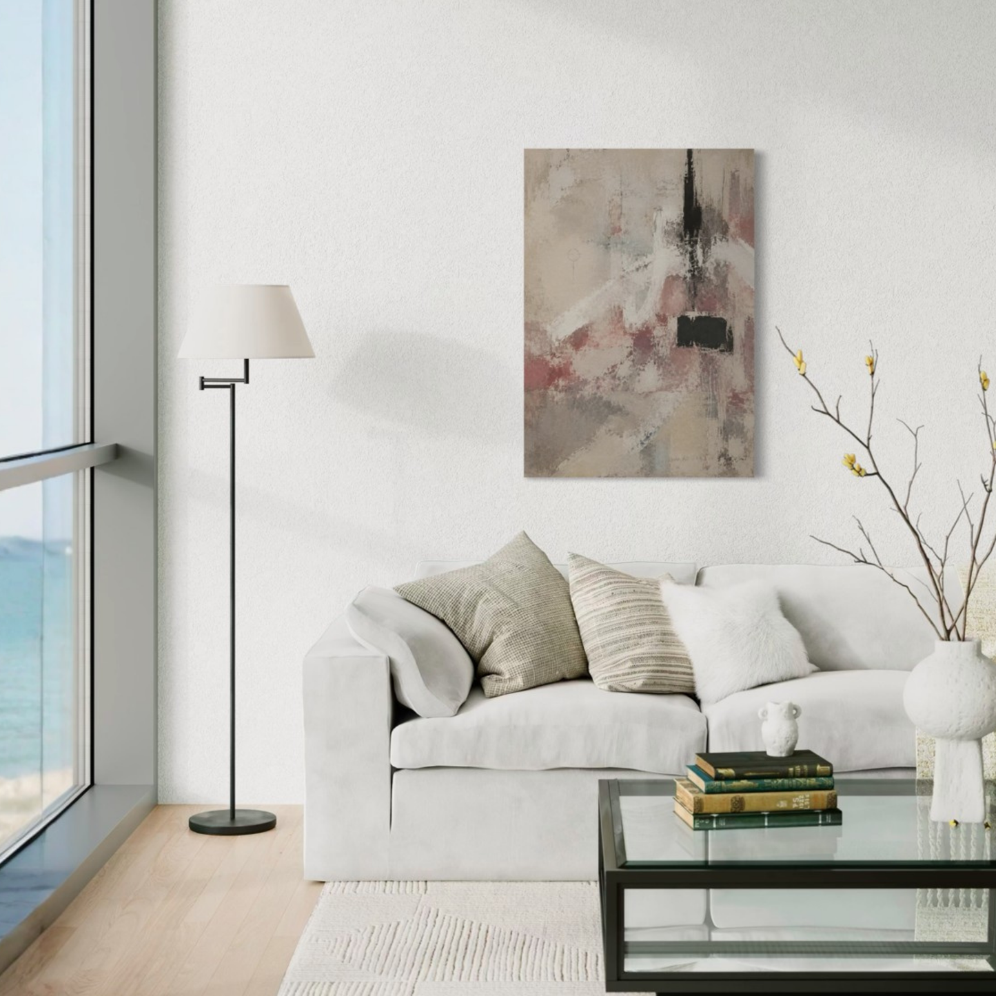 The Unsaid abstract wall art displayed above a pale sofa in a bright minimalist interior.