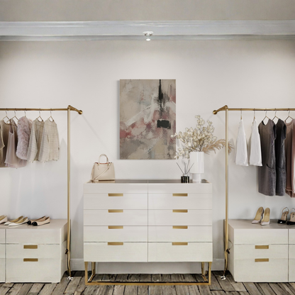 The Unsaid abstract wall art displayed above a light wood dresser in a refined bedroom interior.