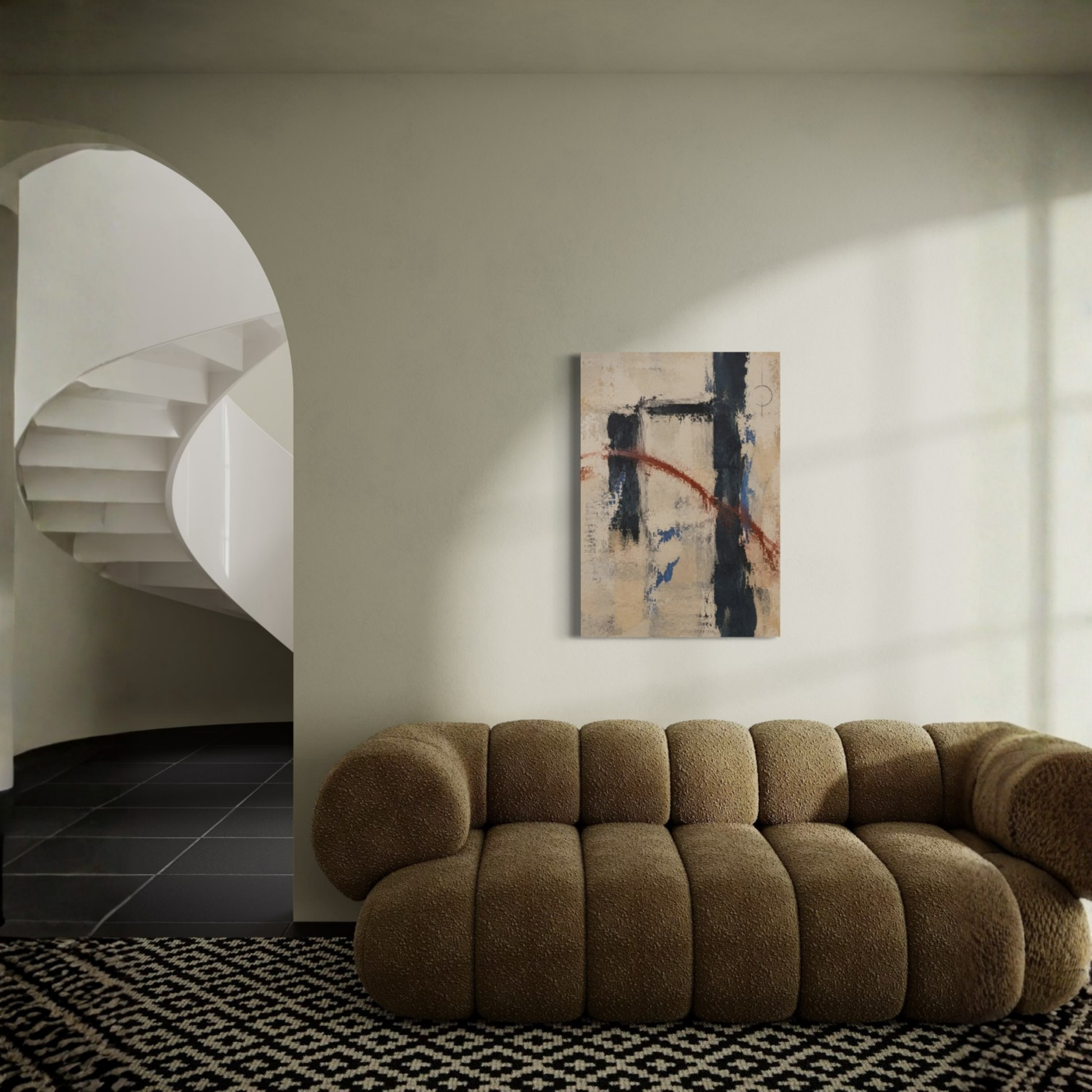 Boundary abstract canvas art displayed above a sculptural brown sofa in a minimalist interior with soft natural light and a curved staircase.