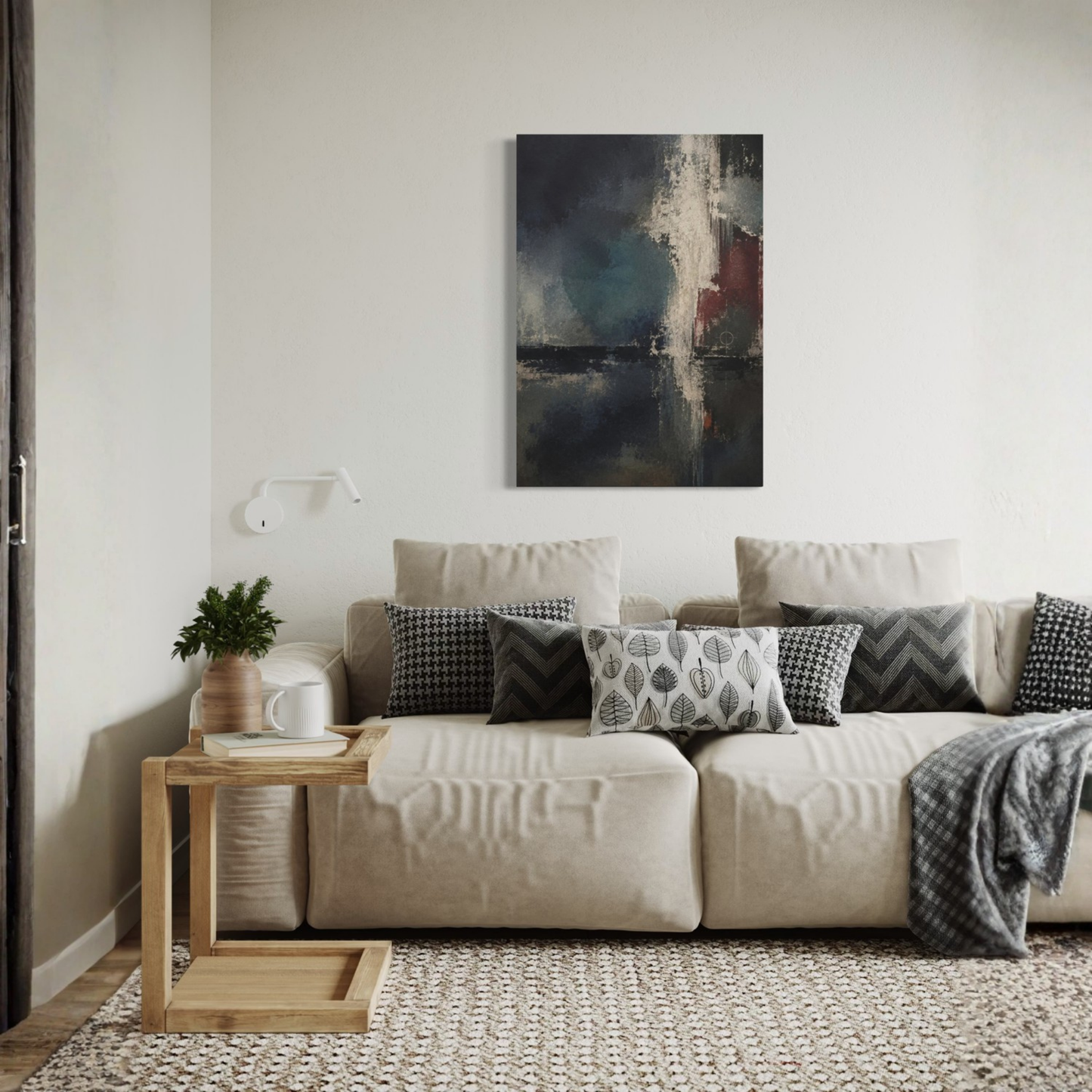 Night Signal dark abstract canvas displayed above a cream sofa in a refined neutral living room.