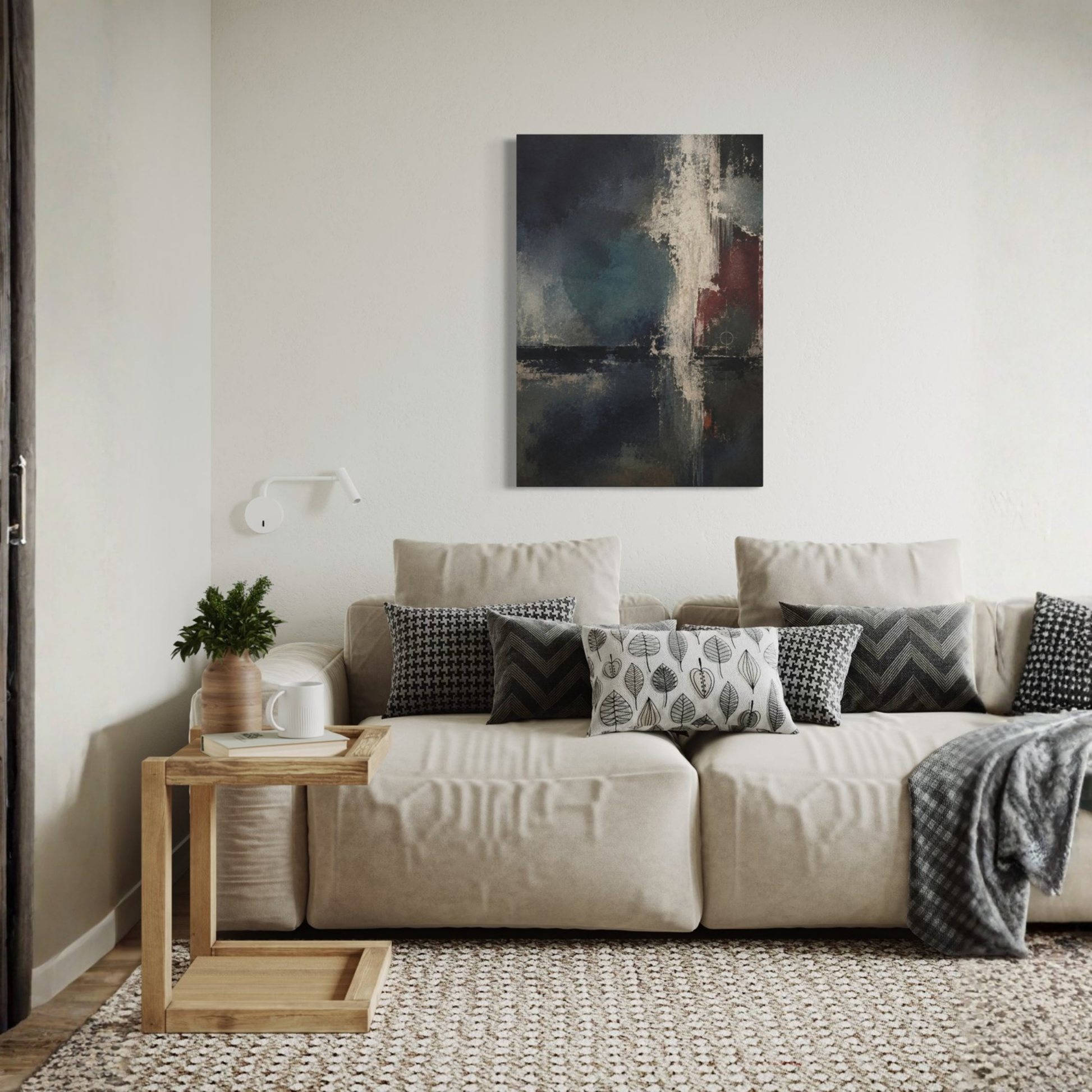 Night Signal dark abstract canvas displayed above a cream sofa in a refined neutral living room.