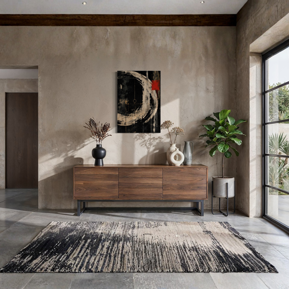 Orbit black and ivory abstract canvas art shown in a refined modern interior.