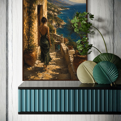 Mediterranean framed art of a woman walking along a coastal path on a wooden shelf with decorative items.