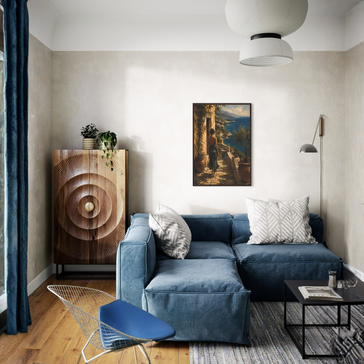 Modern living room with a blue sofa, wooden cabinet, and luxury wall art.