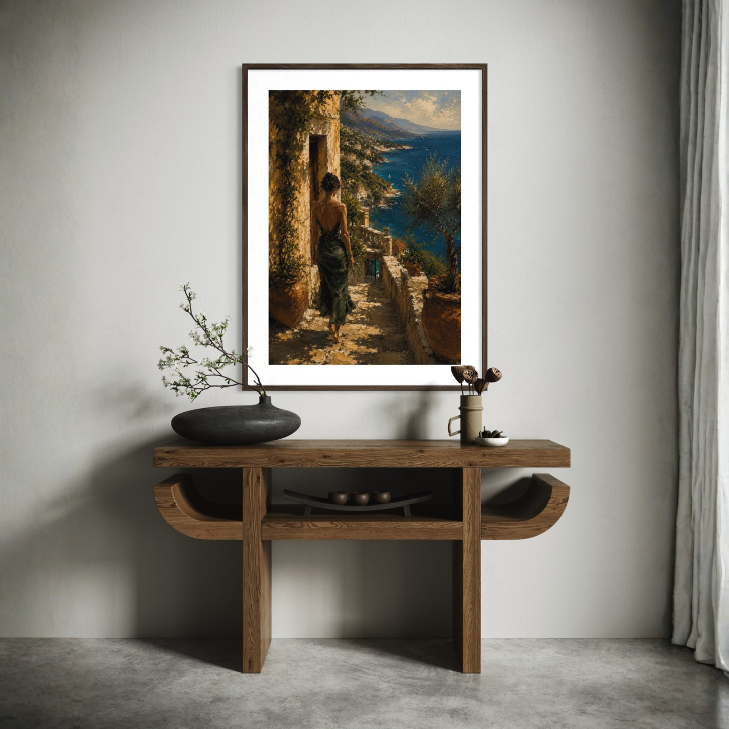 Mediterranean framed art above a wooden console table in a room with a neutral color scheme.