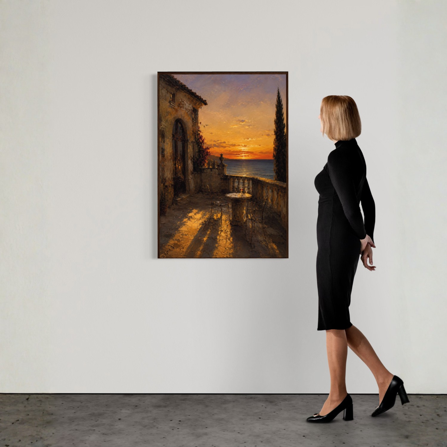 The Hour framed Mediterranean wall art featuring a sunset terrace overlooking the sea, Mediterranean architecture, and golden evening light.