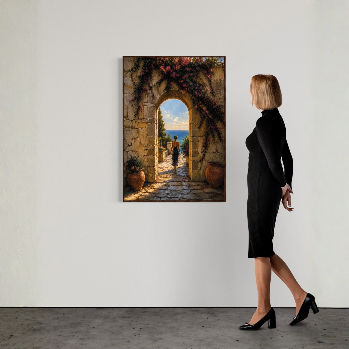 Mediterranean stone archway overlooking the sea with flowering architecture and a solitary woman walking toward the coastline.