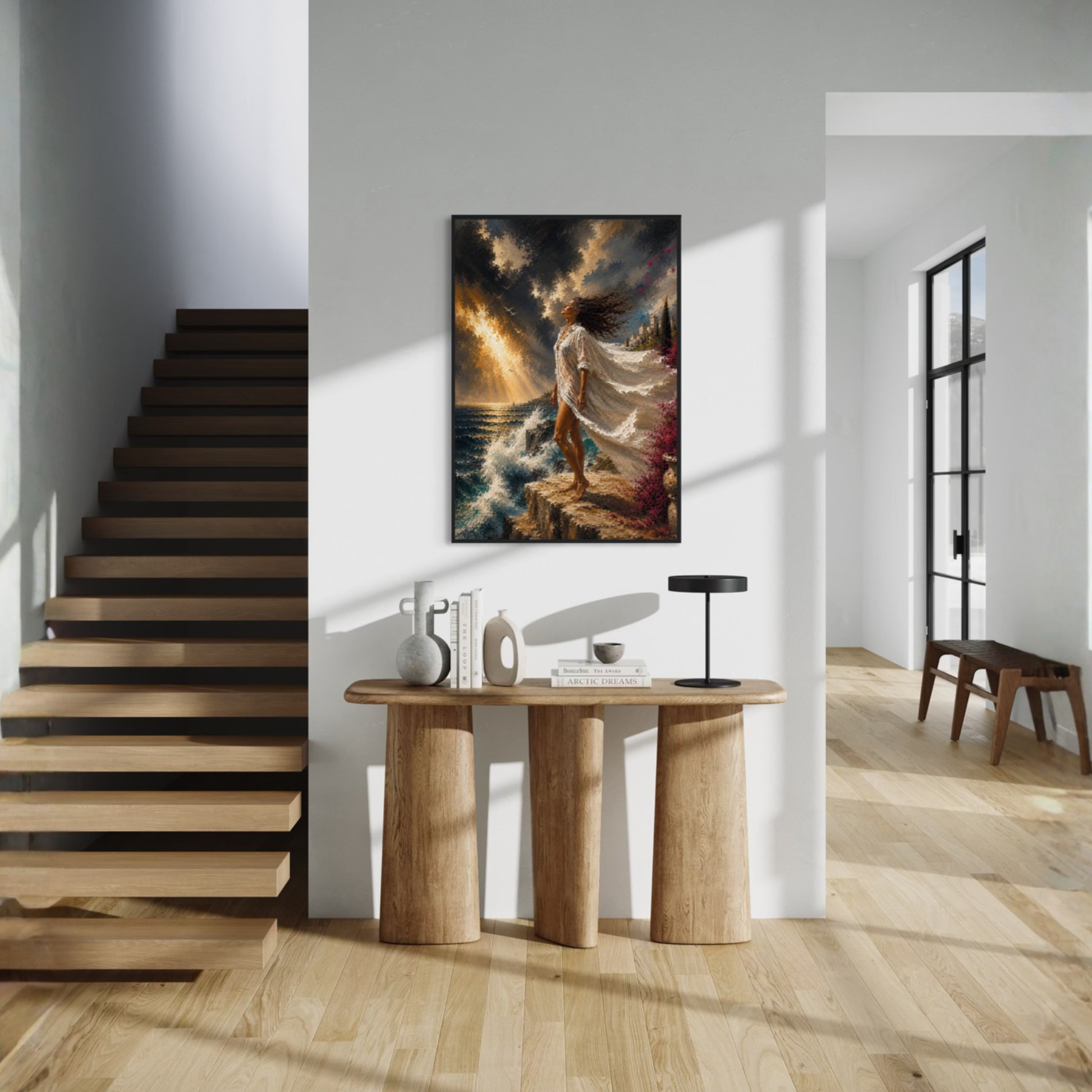The Clearing Mediterranean storm art displayed in a black wood frame displayed on a white wall in a modern minimalist interior with a wooden staircase and console table.
