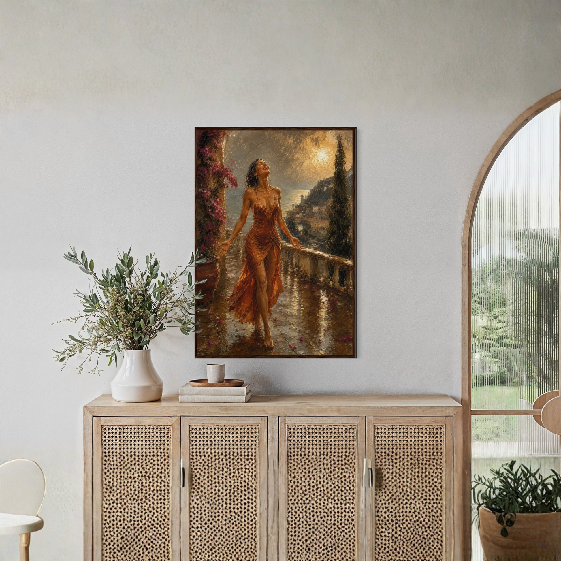 The Sunshower Mediterranean framed art print displayed in a dark wood frame styled on a light wood cabinet in a modern, neutral-toned room.