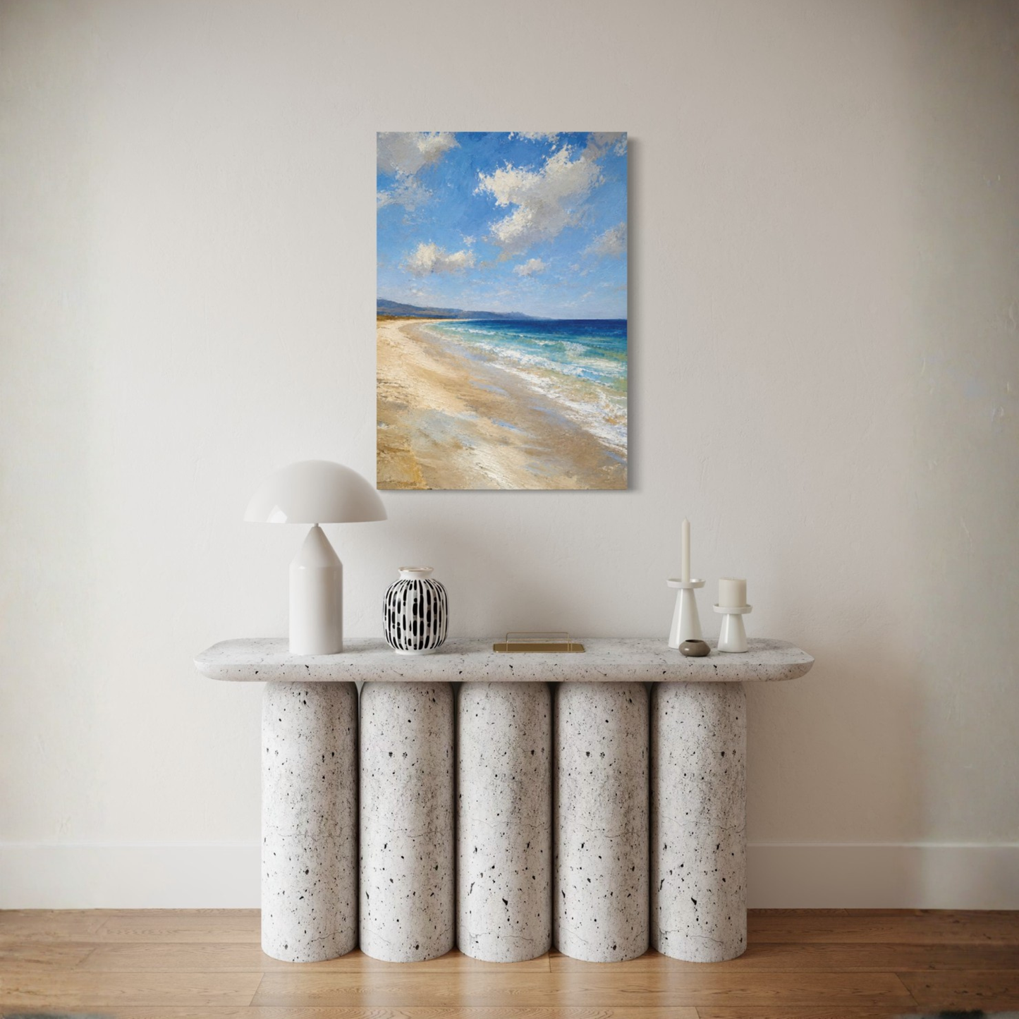 The Blue Distance Mediterranean canvas art displayed on a beige wall above a modern console table with decorative objects.