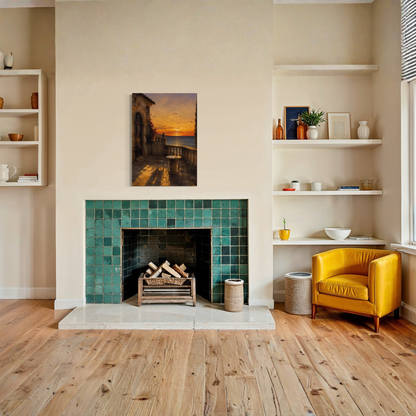The Hour Mediterranean canvas art displayed on a beige wall above a tiled fireplace in a modern living room setting with a yellow armchair and wooden floors.
