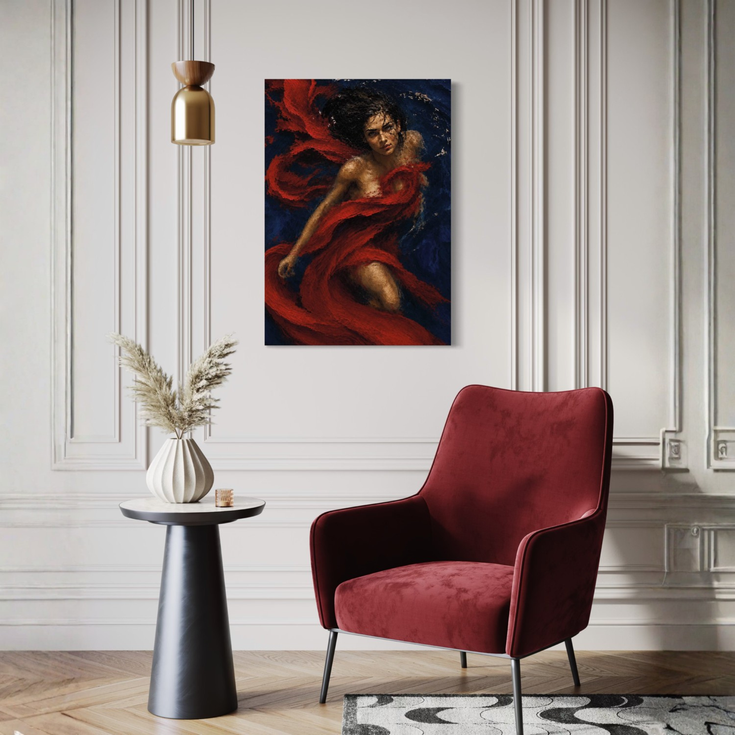 The Crimson Undertow gallery-wrapped canvas displayed on a white paneled wall in a modern living room setting with a red velvet armchair and a side table.