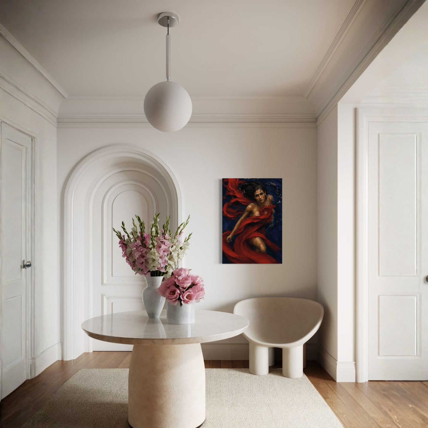 Crimson Undertow underwater woman canvas art displayed on a white wall in a modern, minimalist interior with a round table, pink flowers, and a sculptural chair.