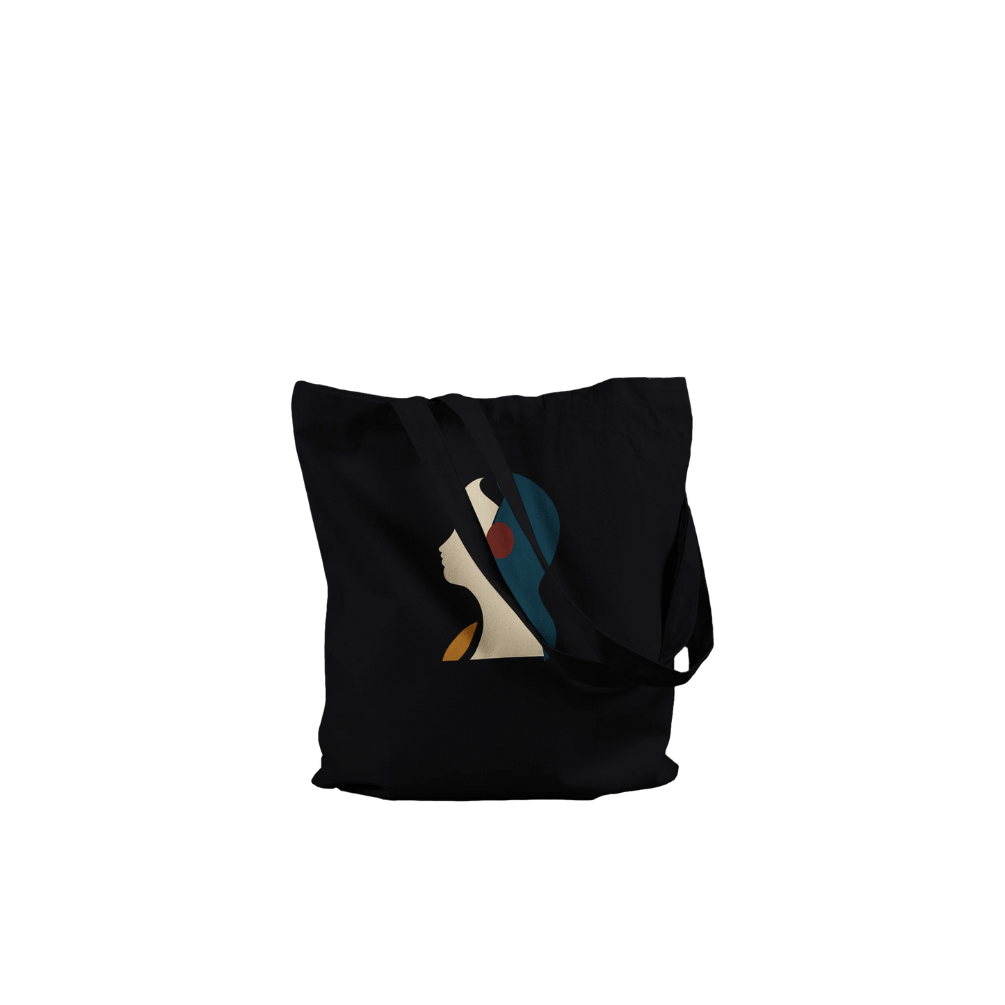 Folded THE LISTENING black cotton tote showing the sculptural profile artwork and substantial fabric texture.