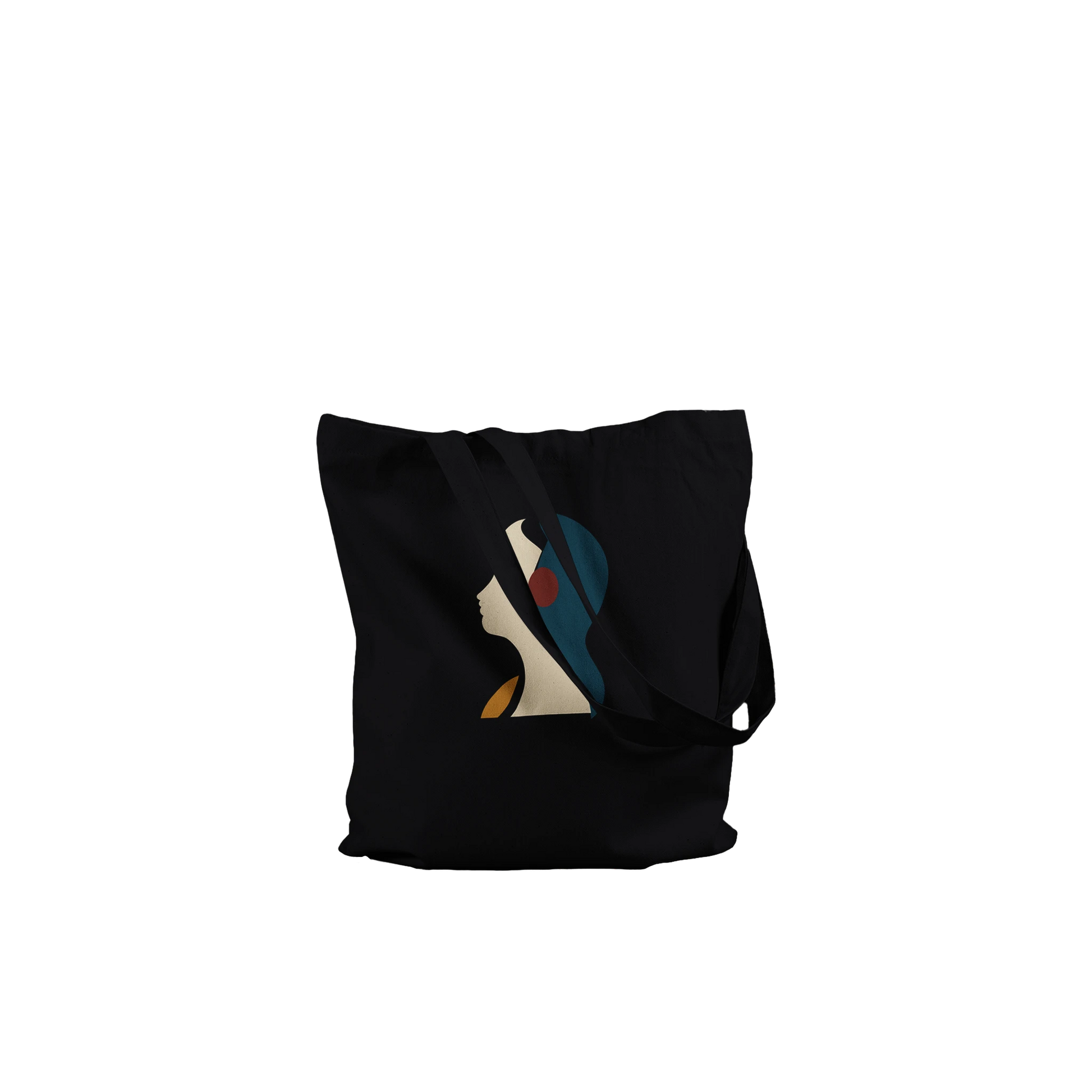 Folded THE LISTENING black cotton tote showing the sculptural profile artwork and substantial fabric texture.
