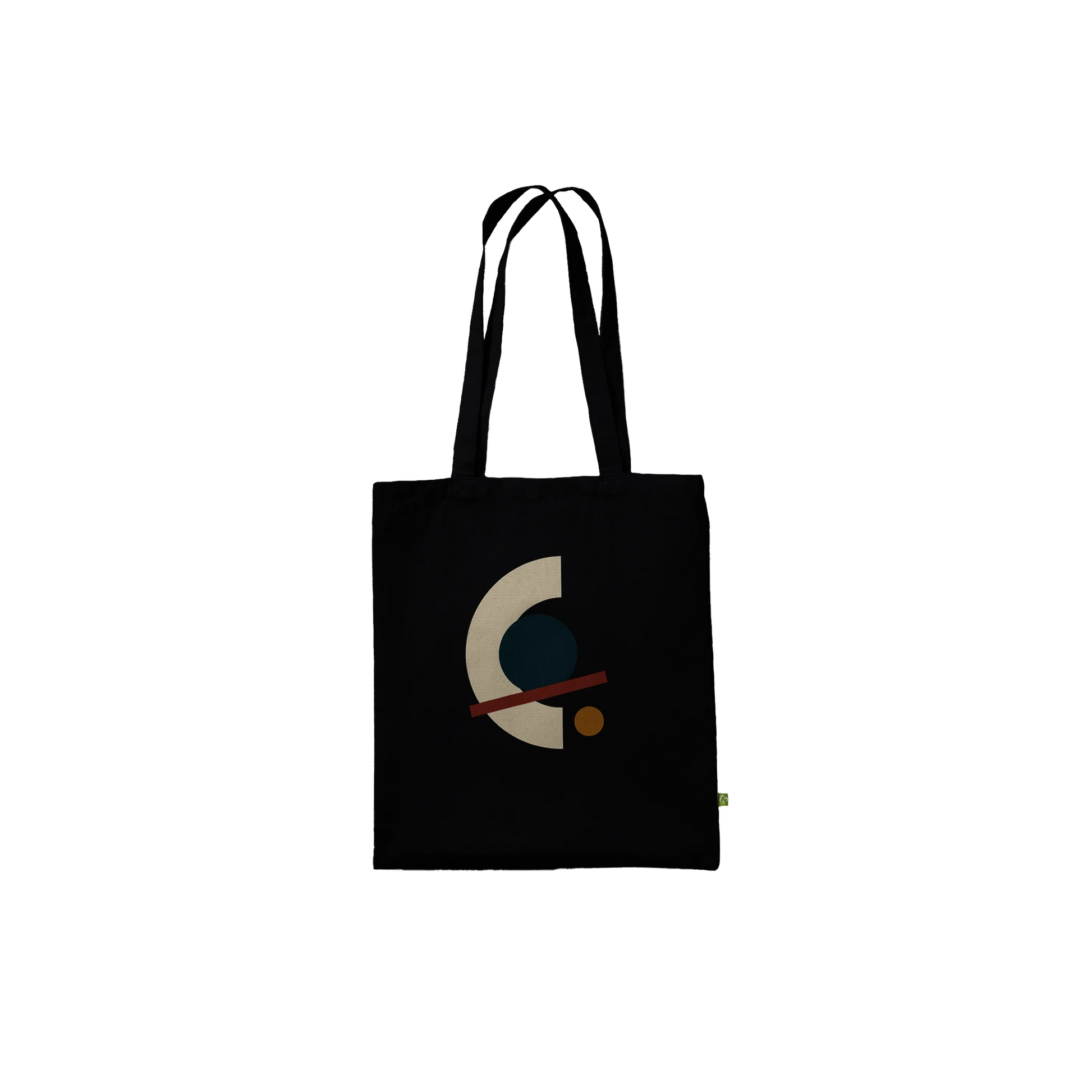 Front view of THE ALIGNMENT black cotton tote with an ivory arc, petrol circle, oxblood axis and ochre disc.