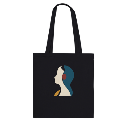 THE LISTENING premium black cotton tote featuring a sculptural ivory profile with petrol-blue, oxblood and ochre accents.